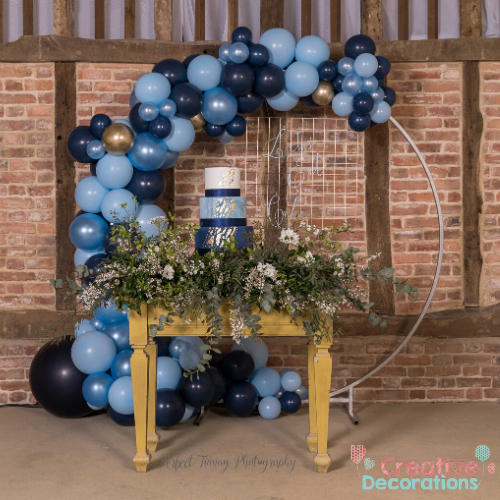 Blue wedding balloon hoop decor 