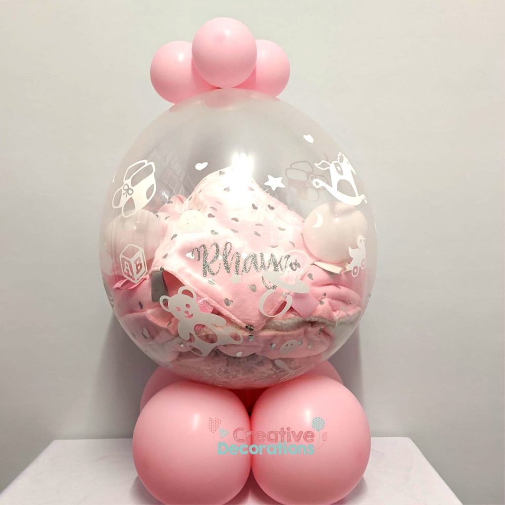 Baby gifts in a stuffed balloon 