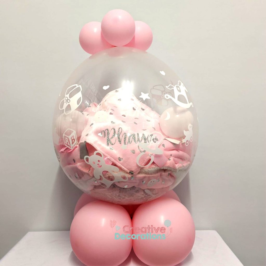 Baby gifts in a stuffed balloon