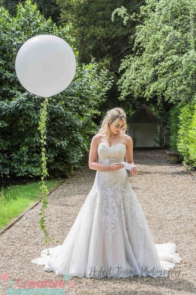 White giant wedding balloon with ivy 
