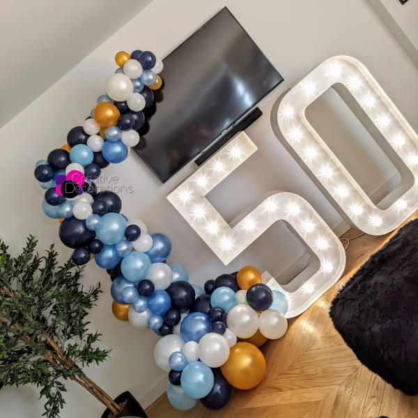 Blue, white & gold half balloon arch