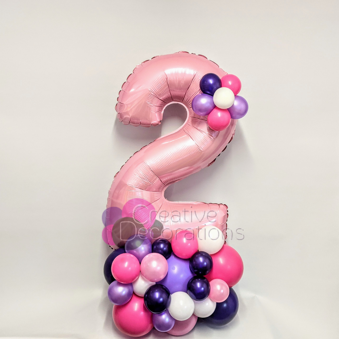 A small number stack using small number balloons and a mini foil balloon 