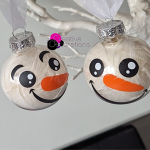 Feather filled baubles with added snowman faces