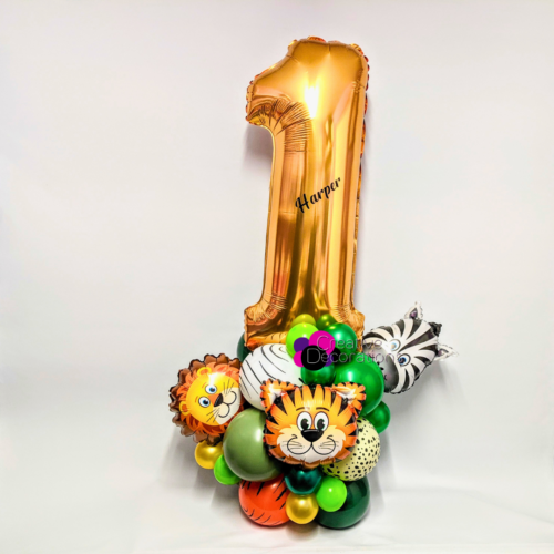 A first birthday number display with mini foil animal balloons